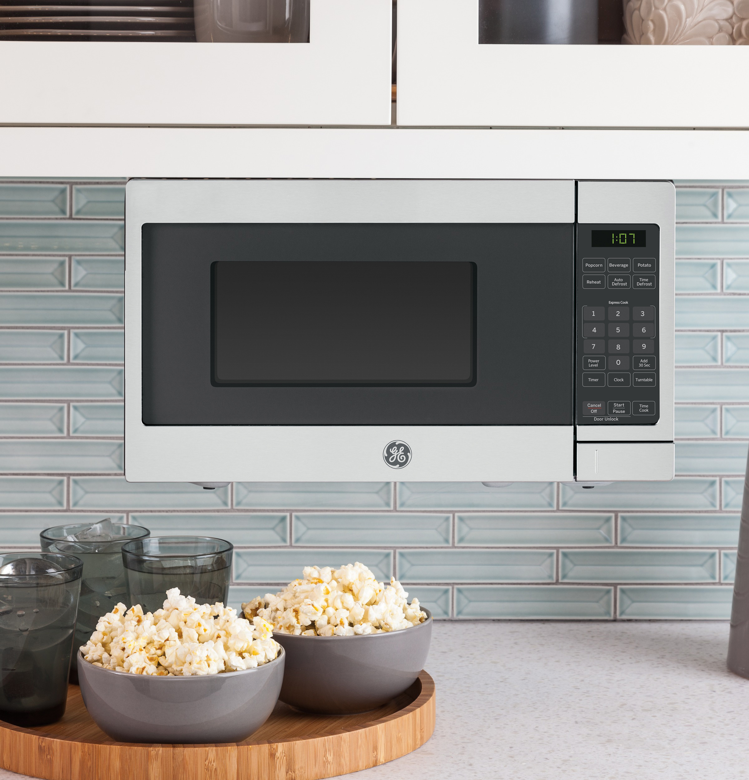 0.7 Cu. Ft. Spacemaker Countertop Microwave Oven GCHK07N1WSS