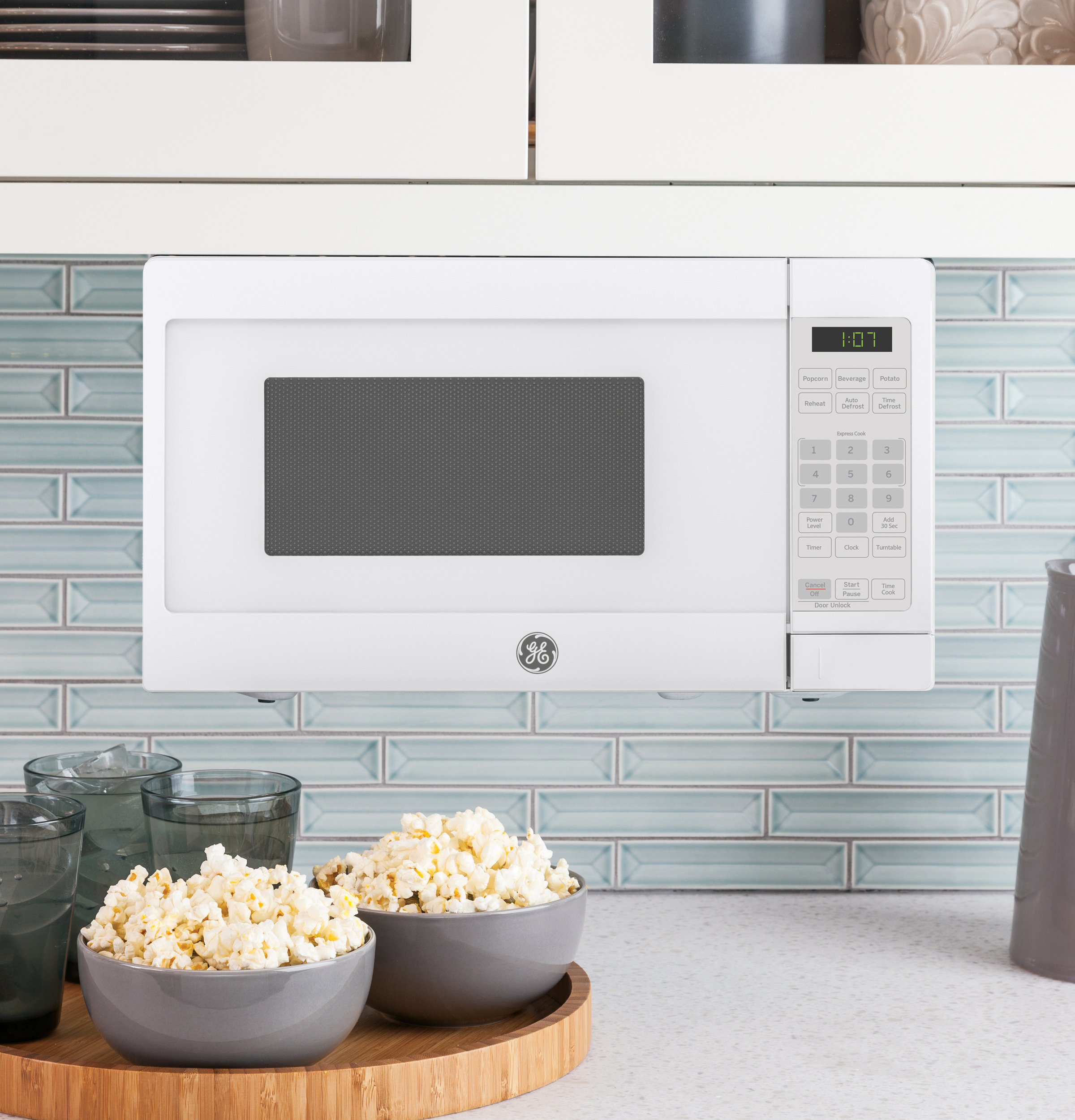 0.7 Cu. Ft. Spacemaker Countertop Microwave Oven GCHK07N1WWW