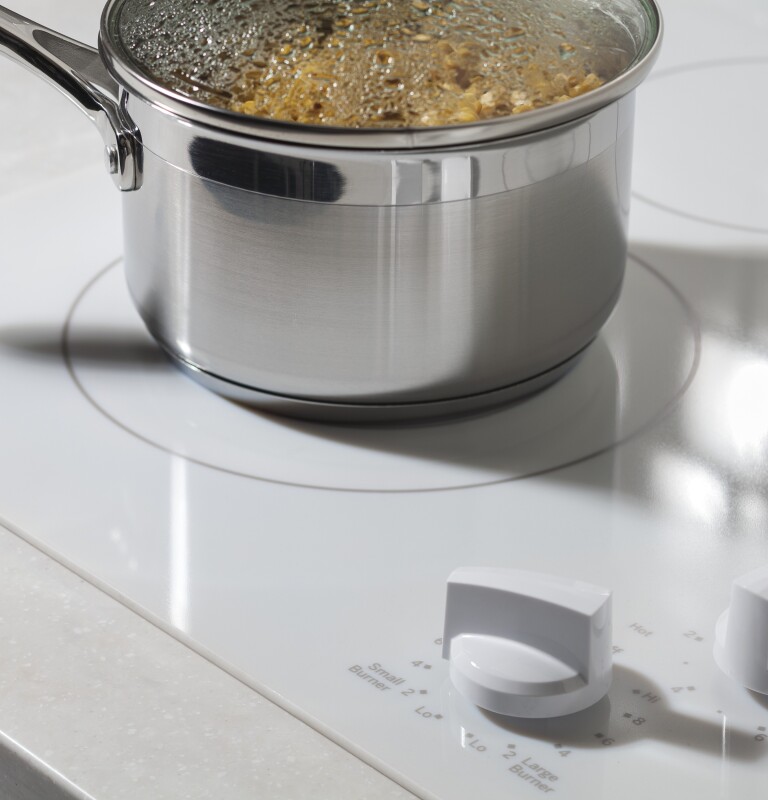 36" Built-In Knob Control Electric Cooktop JP3536TJWW