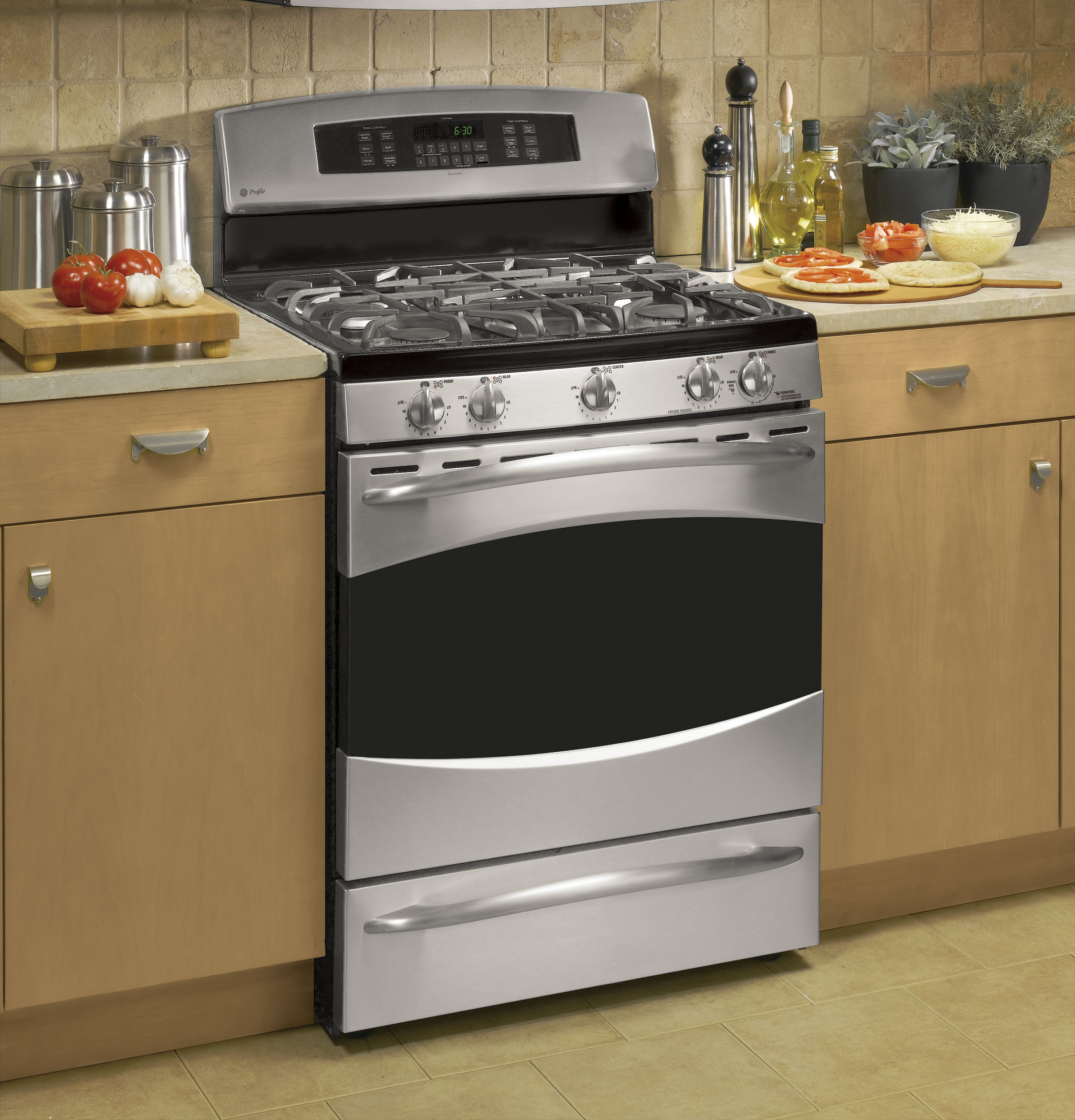 30" Free-Standing Self Clean Convection Gas Range with Warming Drawer PGB916SEMSS