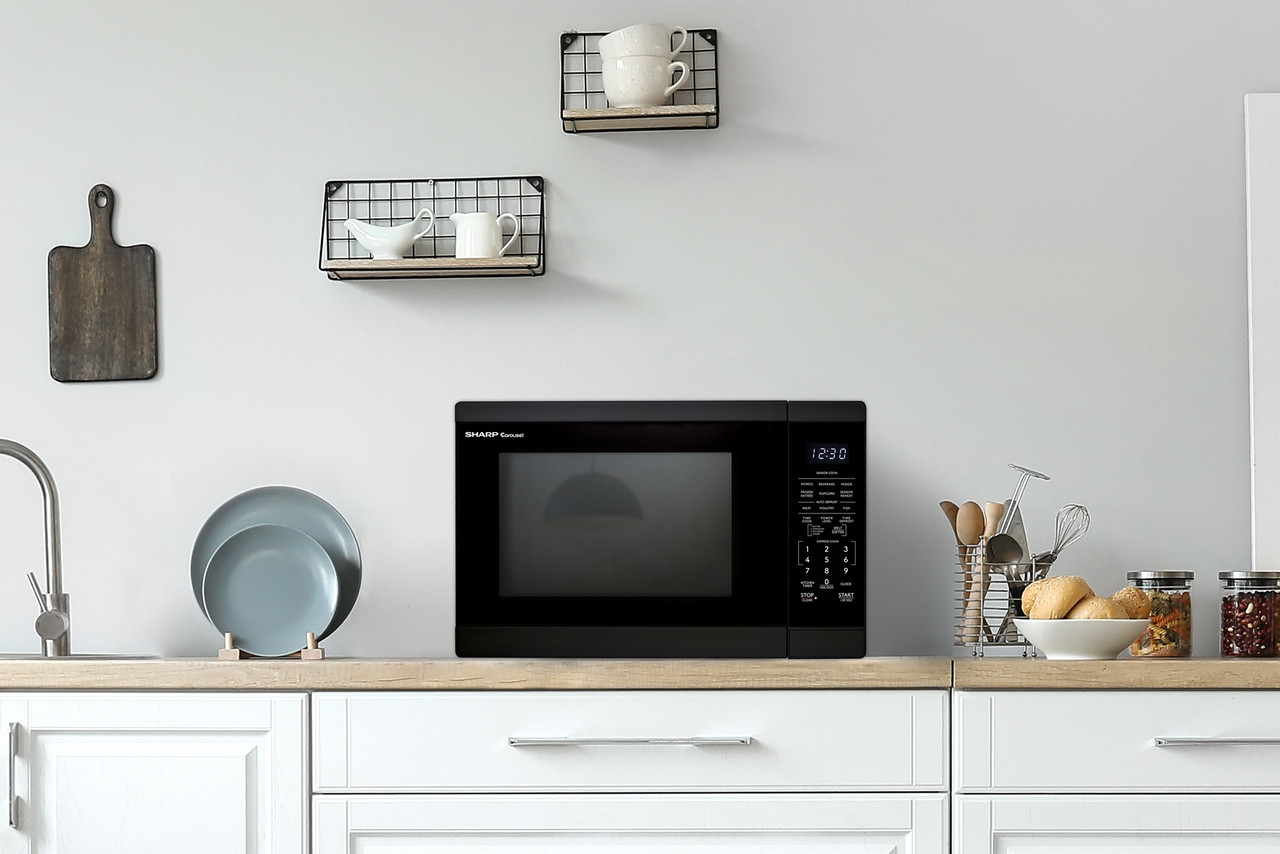1.4 Cu. Ft. 1100w Black Countertop Microwave Oven SMC1461KB