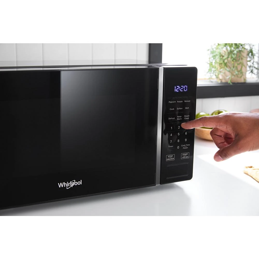 0.7 cu. ft. Black Countertop Microwave With Steam Clean - 700 watt WMCS3018RB