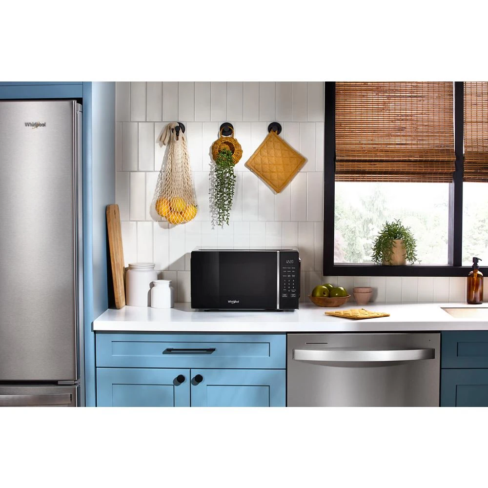 0.7 cu. ft. Black Countertop Microwave With Steam Clean - 700 watt WMCS3018RB