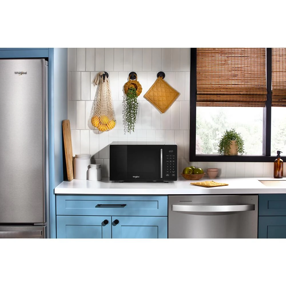 0.9 cu. ft. Black Countertop Microwave With Steam Clean - 900 watt WMCS3019RB