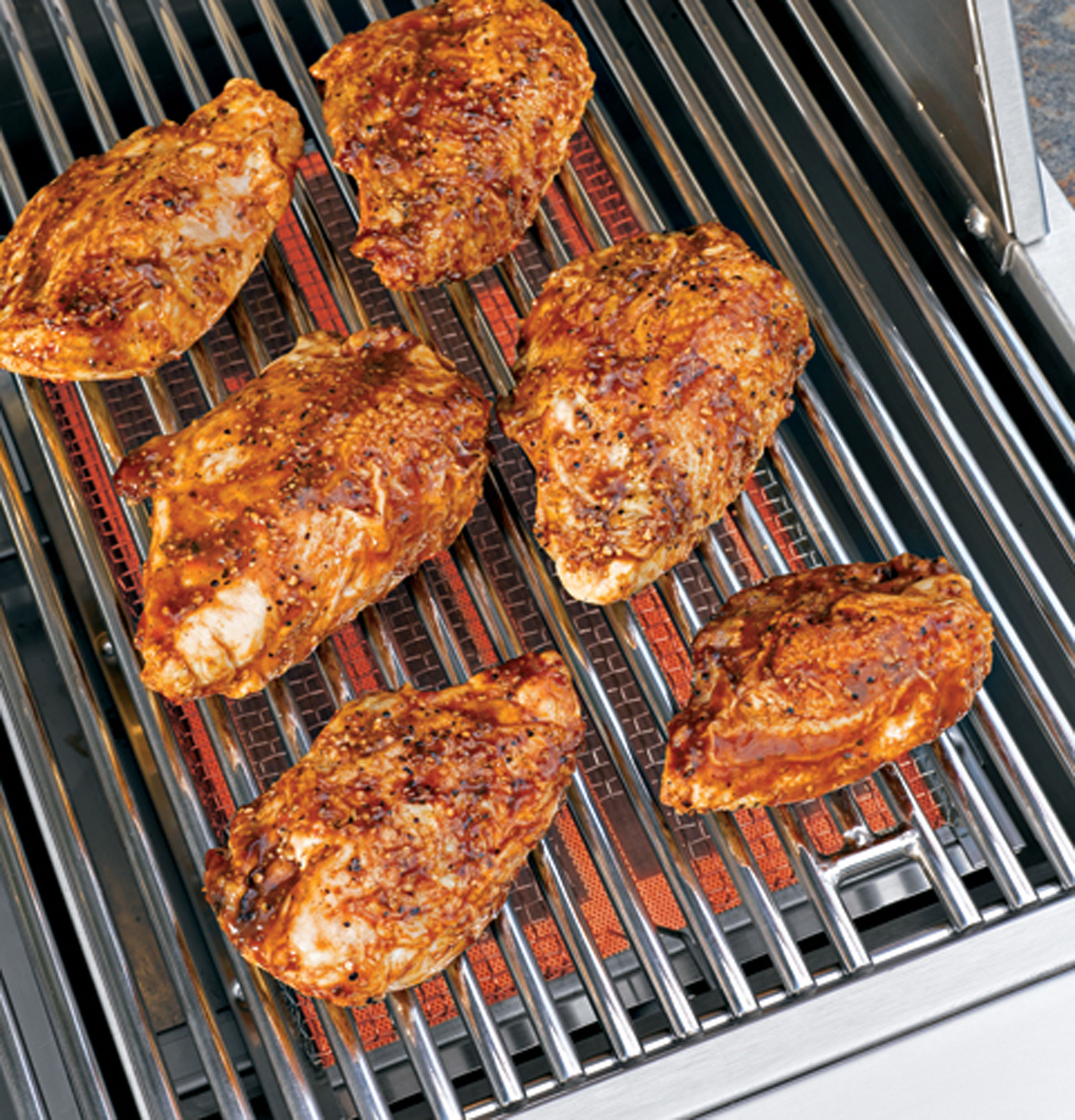 GE 54" Outdoor Cooking Center with Integrated Side Burners ZGG542LCPSS