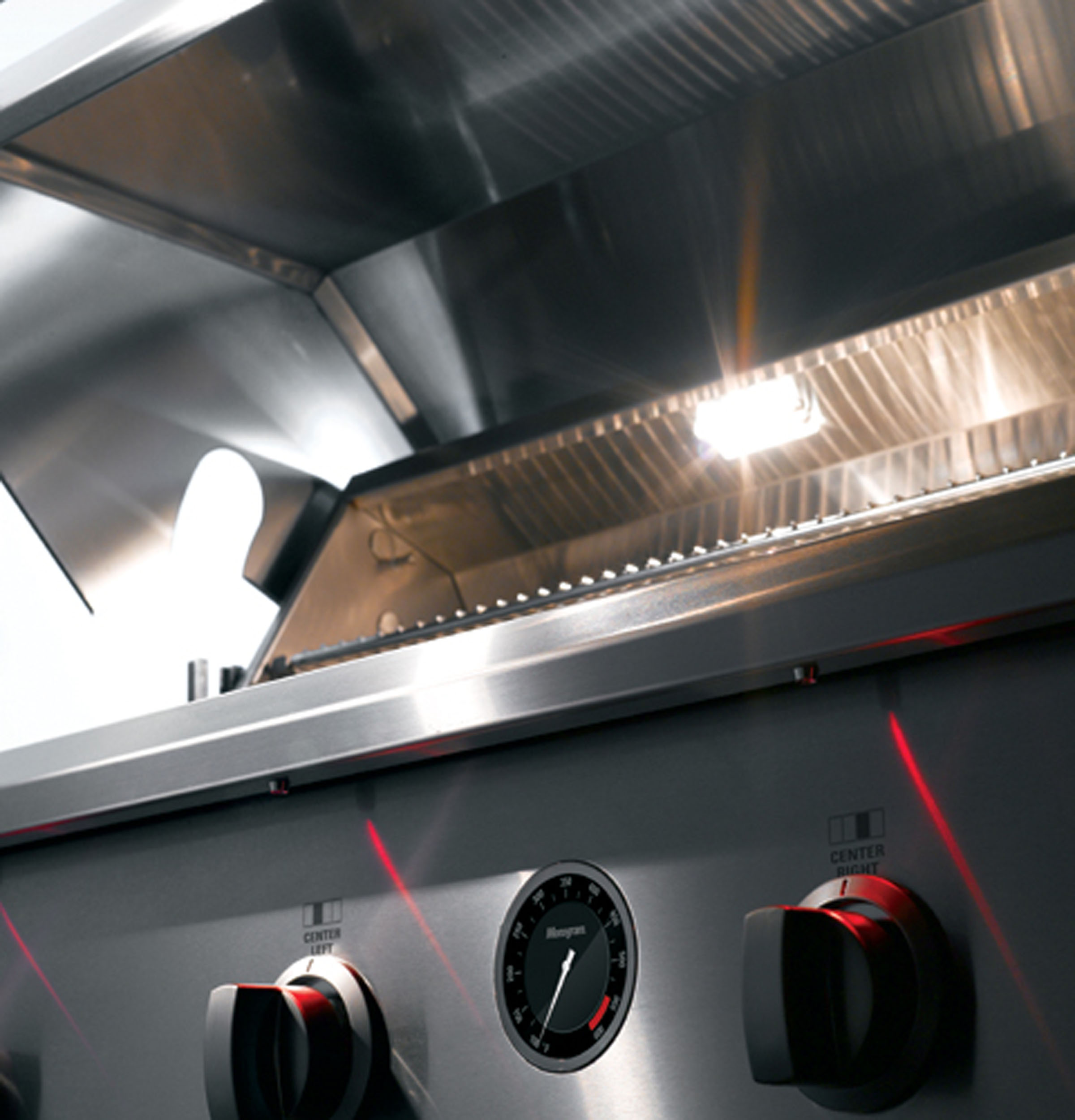 GE 54" Outdoor Cooking Center with Integrated Side Burners ZGG542LCPSS
